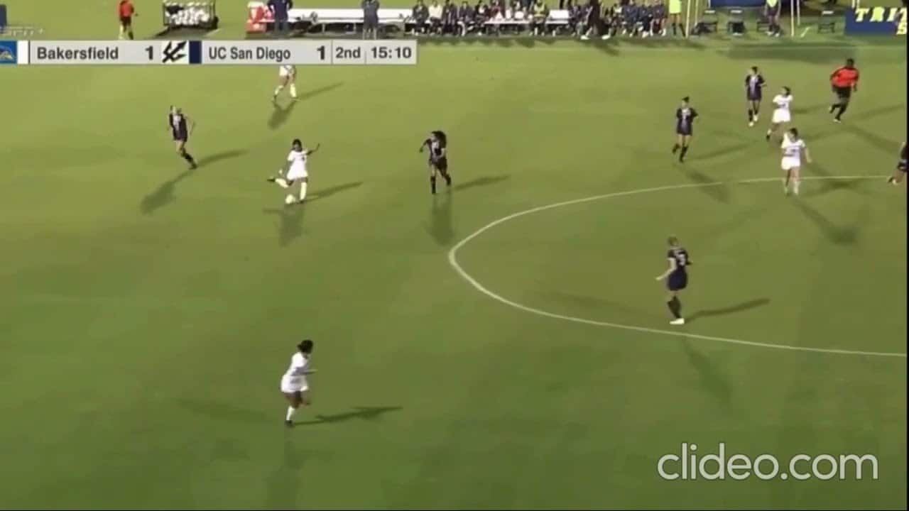 A soccer match between Bakersfield and UC San Diego. The score is tied 1-1 with 15:10 remaining in the second half. Players are spread across the field.