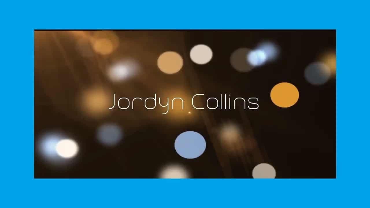 Text "Jordyn Collins" overlaying blurred circular lights on a dark background, framed by a blue border.