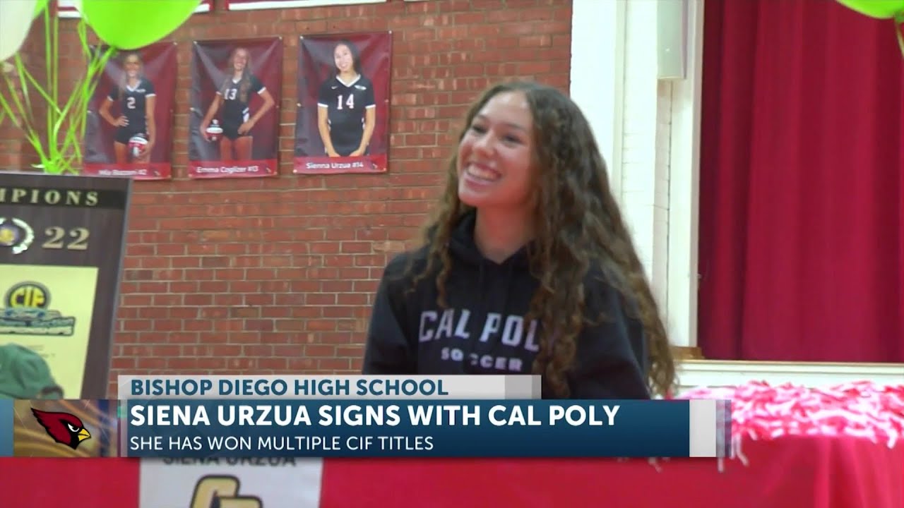 A student wearing a "Cal Poly" sweater smiles at a signing event. A banner and sports photos are visible in the background. Text on the image announces her signing with Cal Poly for soccer.